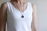 Shell Imprint Black Circle Shimmer Necklace in Gold