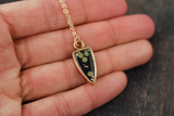 Gold and Black Arrowhead Seed Pod Necklace