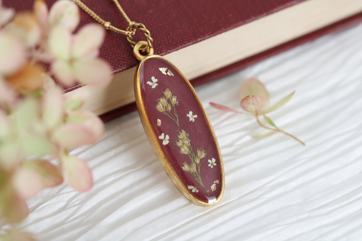 Burgundy and Gold Long Oval Pendant with Flowers
