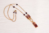 gold and burgundy dressy necklace with garnets