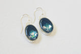 pair of handmade resin and clay blue and silver oval dangle earrings