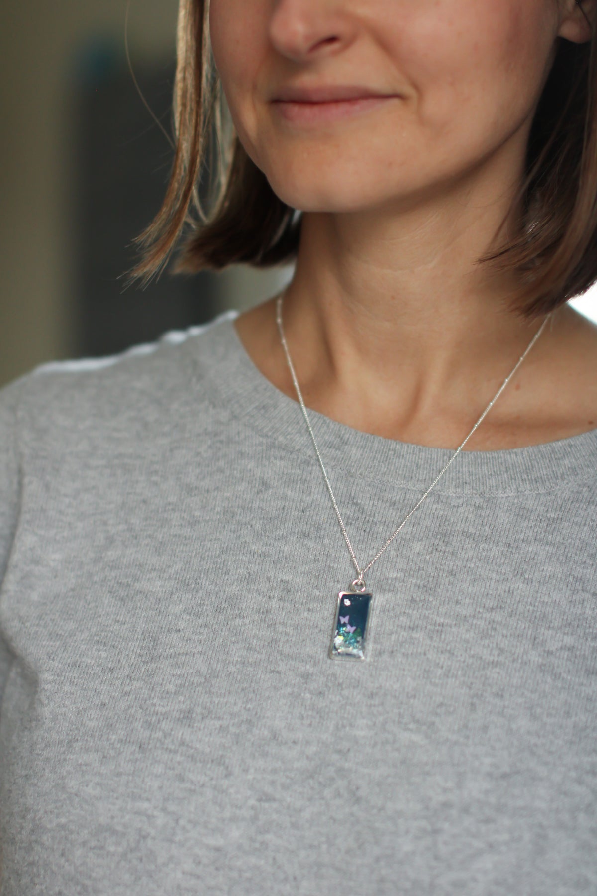Blue Shimmer Pendant Necklace with Butterflies