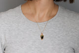 Gold and Black Arrowhead Seed Pod Necklace