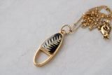 Gold and Black Fern Split Oval Necklace