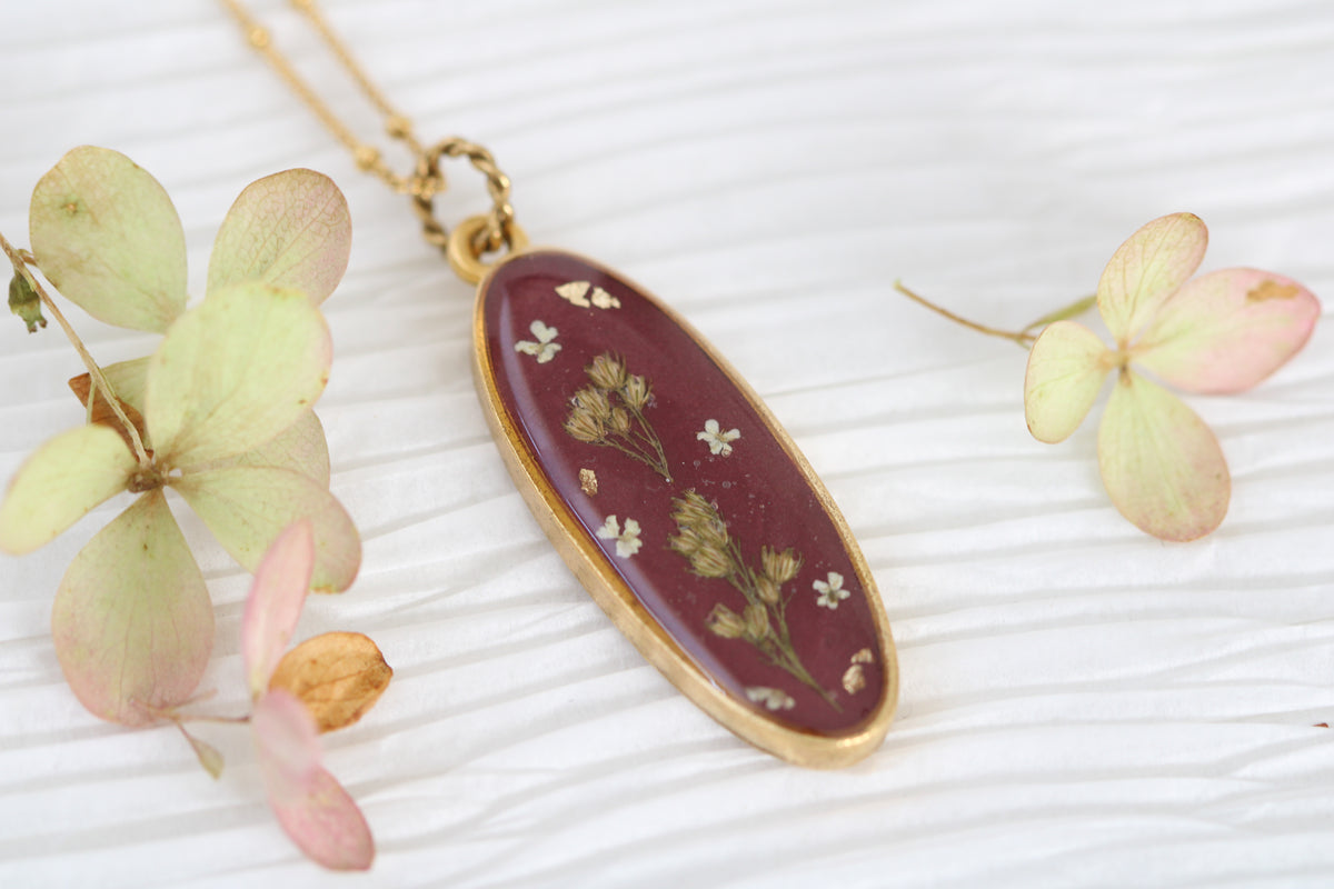 Burgundy and Gold Long Oval Pendant with Flowers