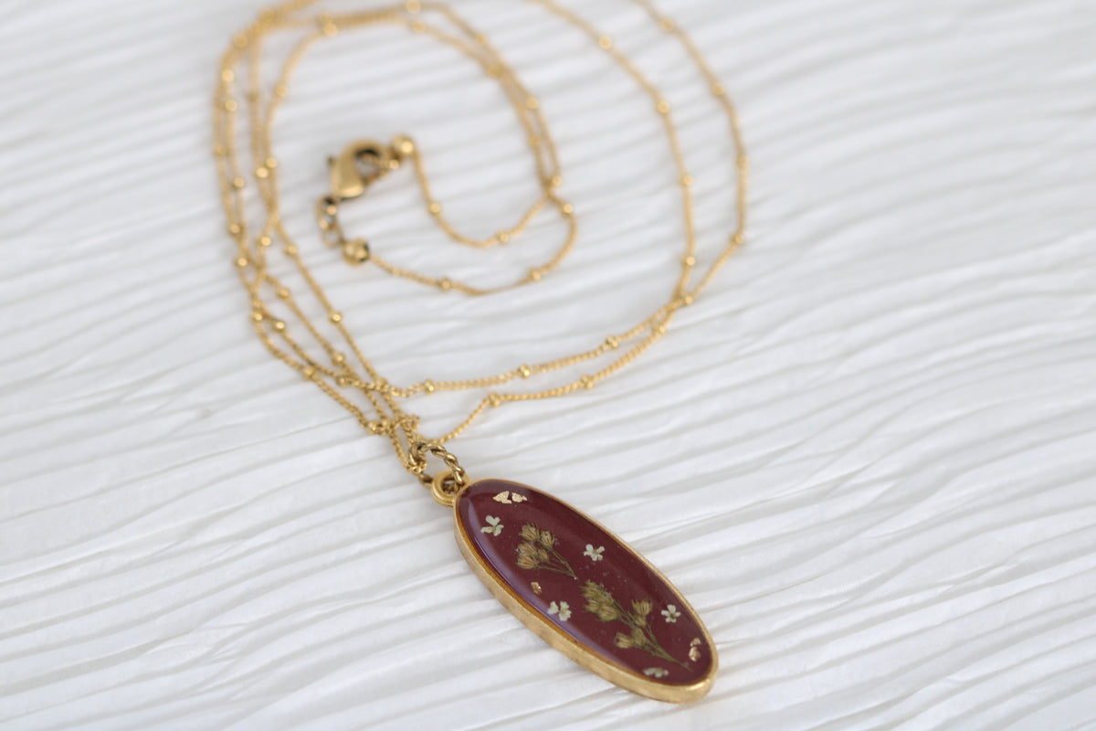 Burgundy and Gold Long Oval Pendant with Flowers