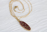 Burgundy and Gold Long Oval Pendant with Flowers