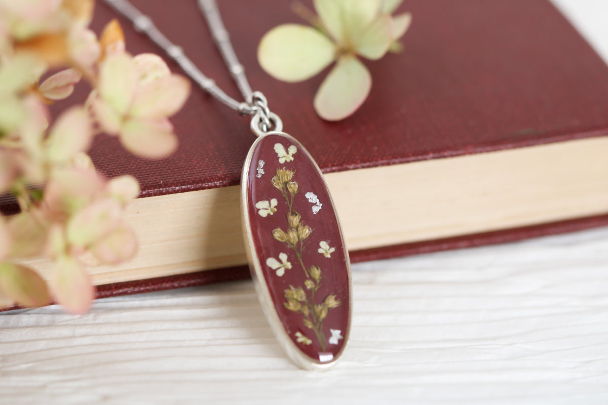 Burgundy and Silver Long Oval Pendant with Flowers