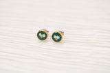 gold and dark green circle stud earrings with white dried alyssum flower handmade in clay with resin