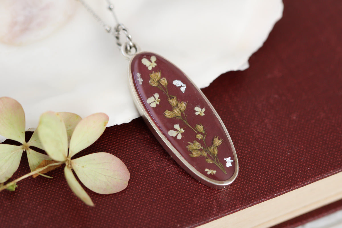 Burgundy and Silver Long Oval Pendant with Flowers