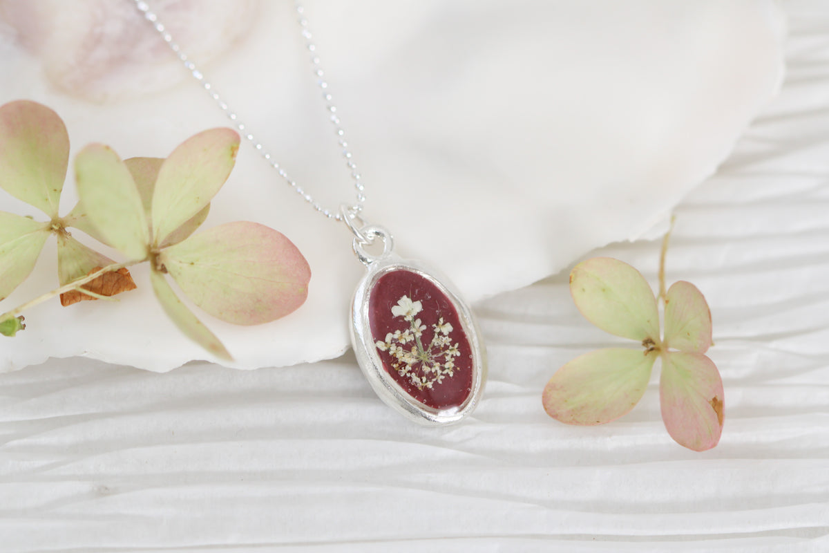 Burgundy Queen Anne’s Lace Tiny Oval Necklace in Silver- Real Flowers in Resin Handmade Necklace
