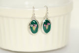 Green and Silver Oval Earrings with Purple Yarrow Flower | Handmade Resin and Flower Earrings