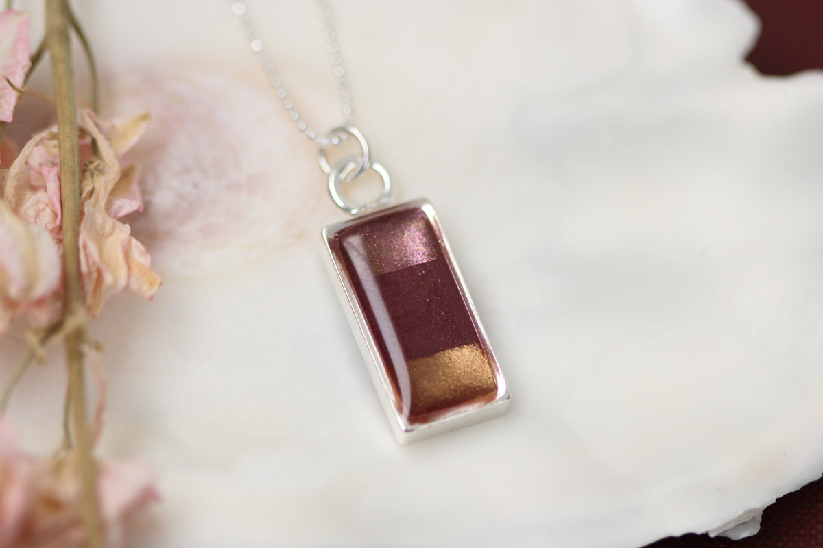 resin necklace
silver charm necklace
simple silver necklace
silver and burgundy necklace
clay jewelry
resin jewelry