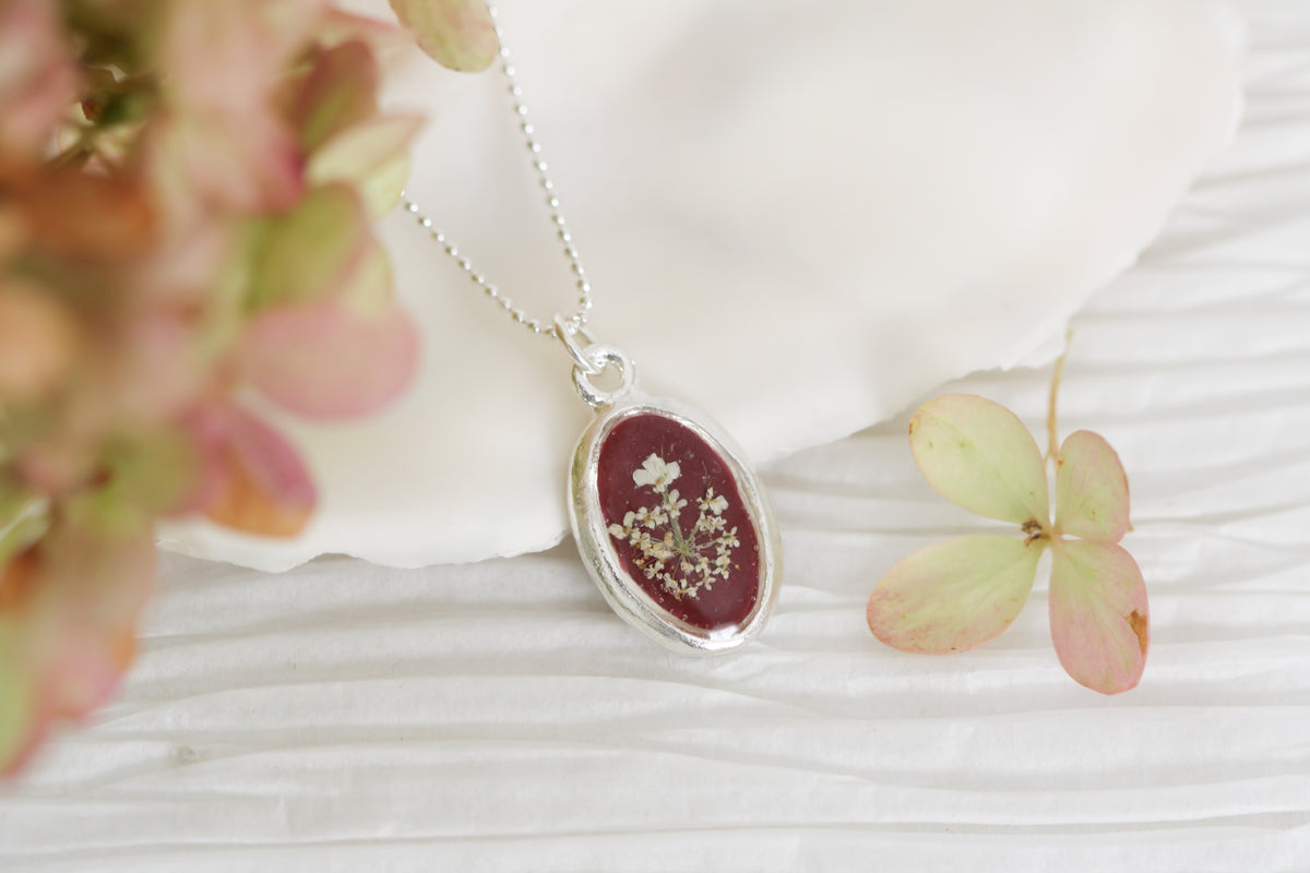 Burgundy Queen Anne’s Lace Tiny Oval Necklace in Silver- Real Flowers in Resin Handmade Necklace