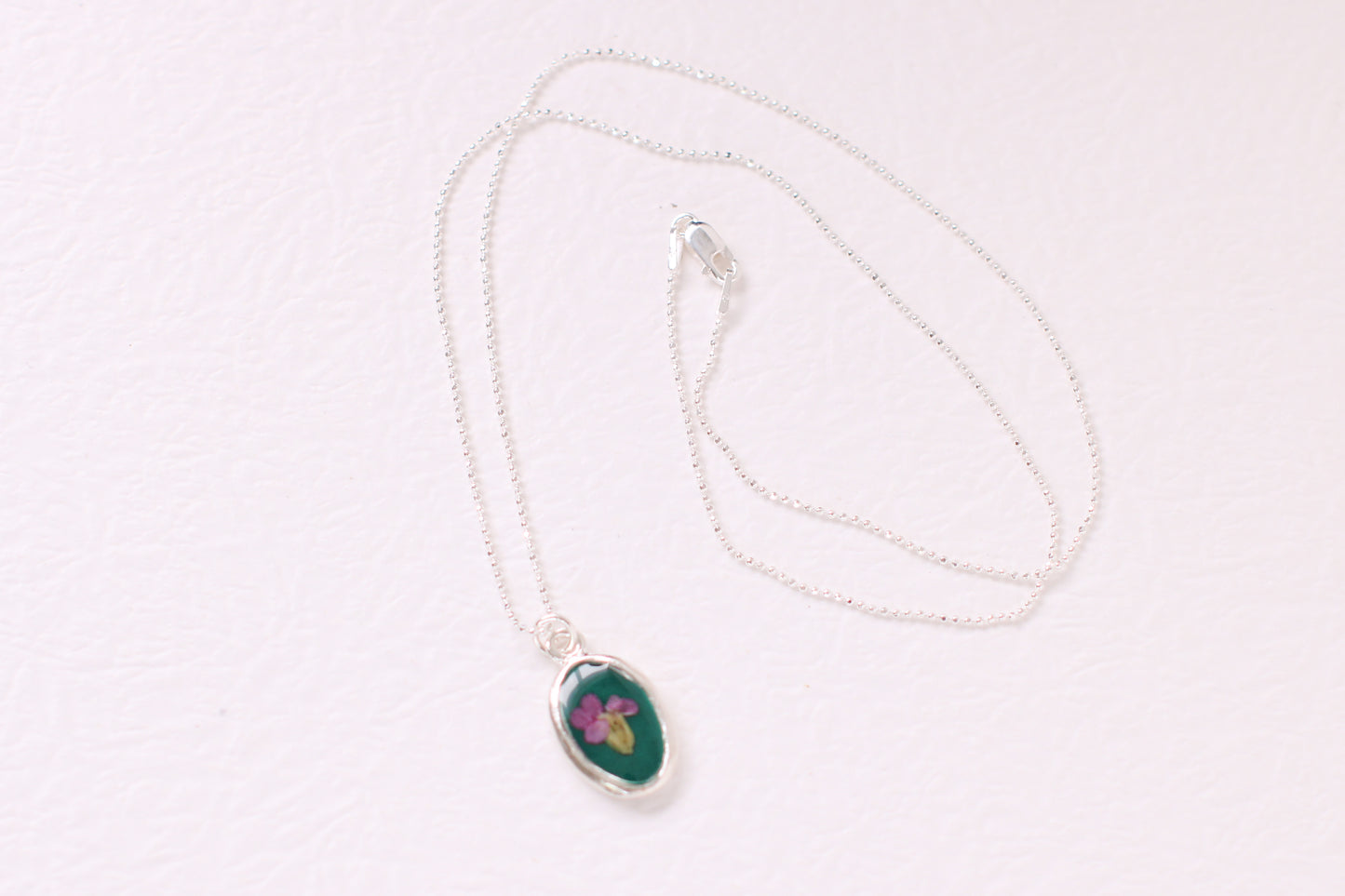 Green and Silver Oval Necklace with Purple Yarrow Flower | Handmade Resin and Flower Necklace