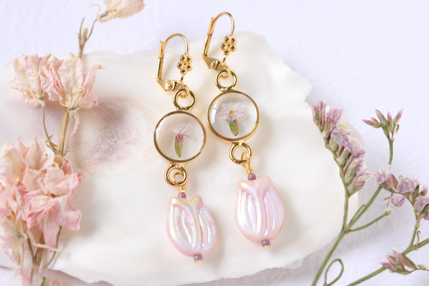 long dangle gold earrings with dried flower and purple tulip bead