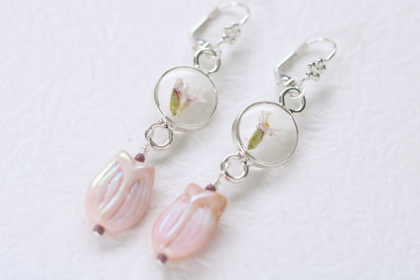 silver and purple long dangle earrings with pressed flower in resin and tulip flower bead