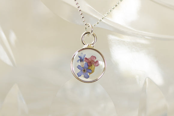 Silver Mini Circle Necklace with Blue Flowers
