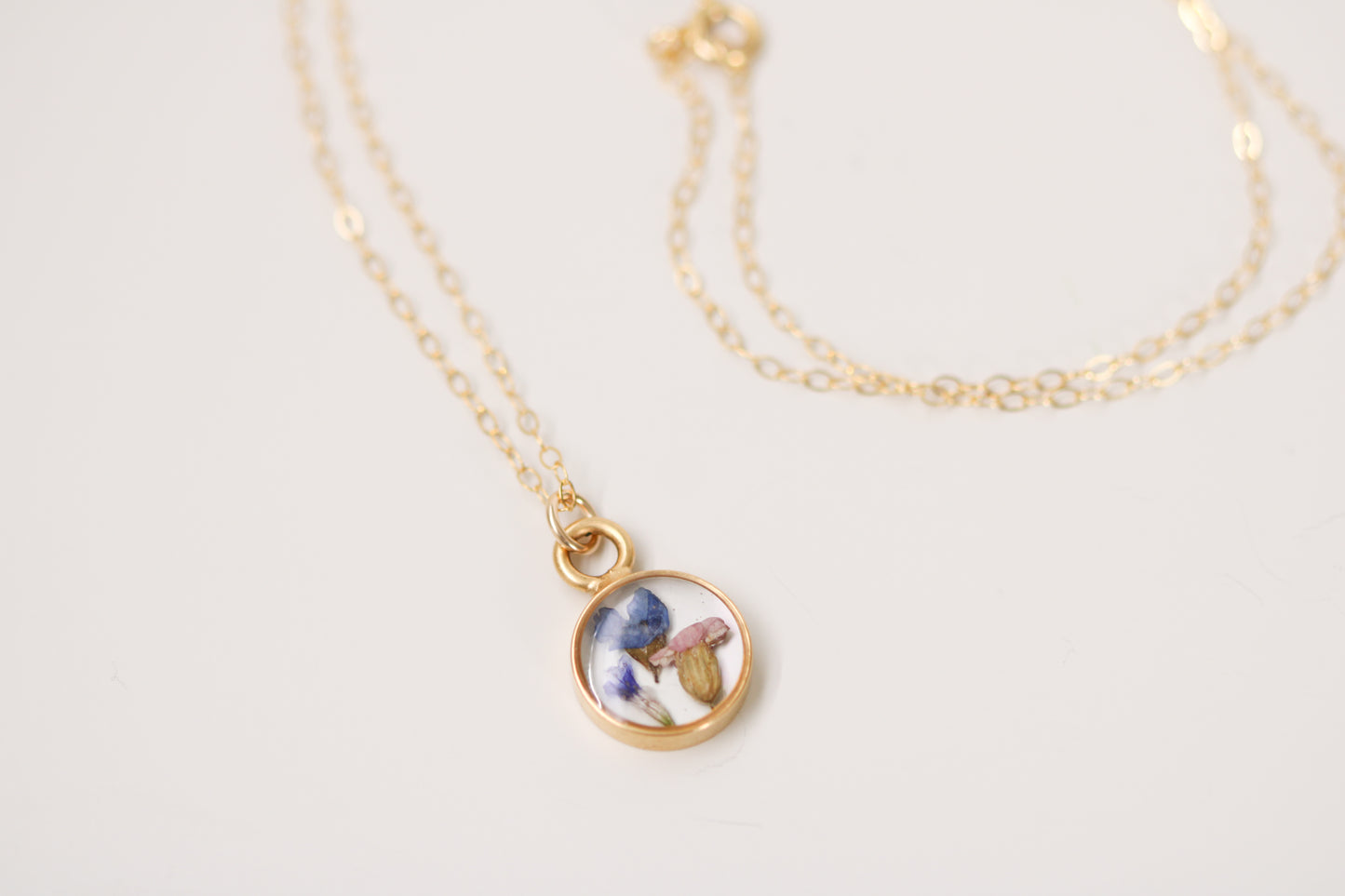 Gold Mini Circle Necklace with Blue Flowers