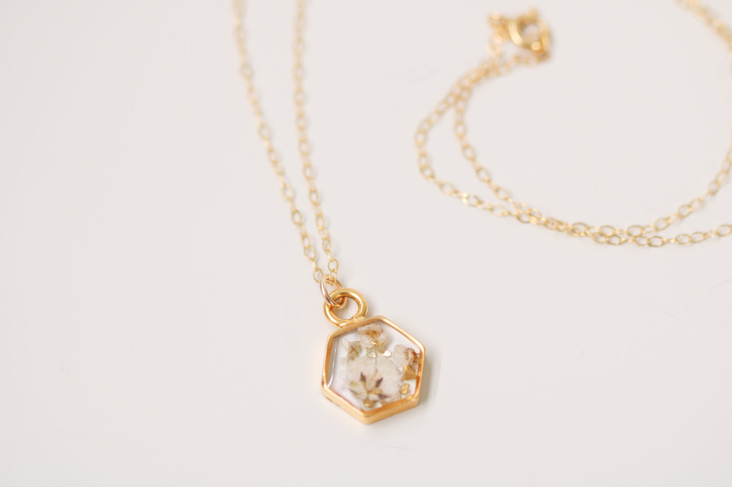 handmade resin and flower hexagon necklace in gold
