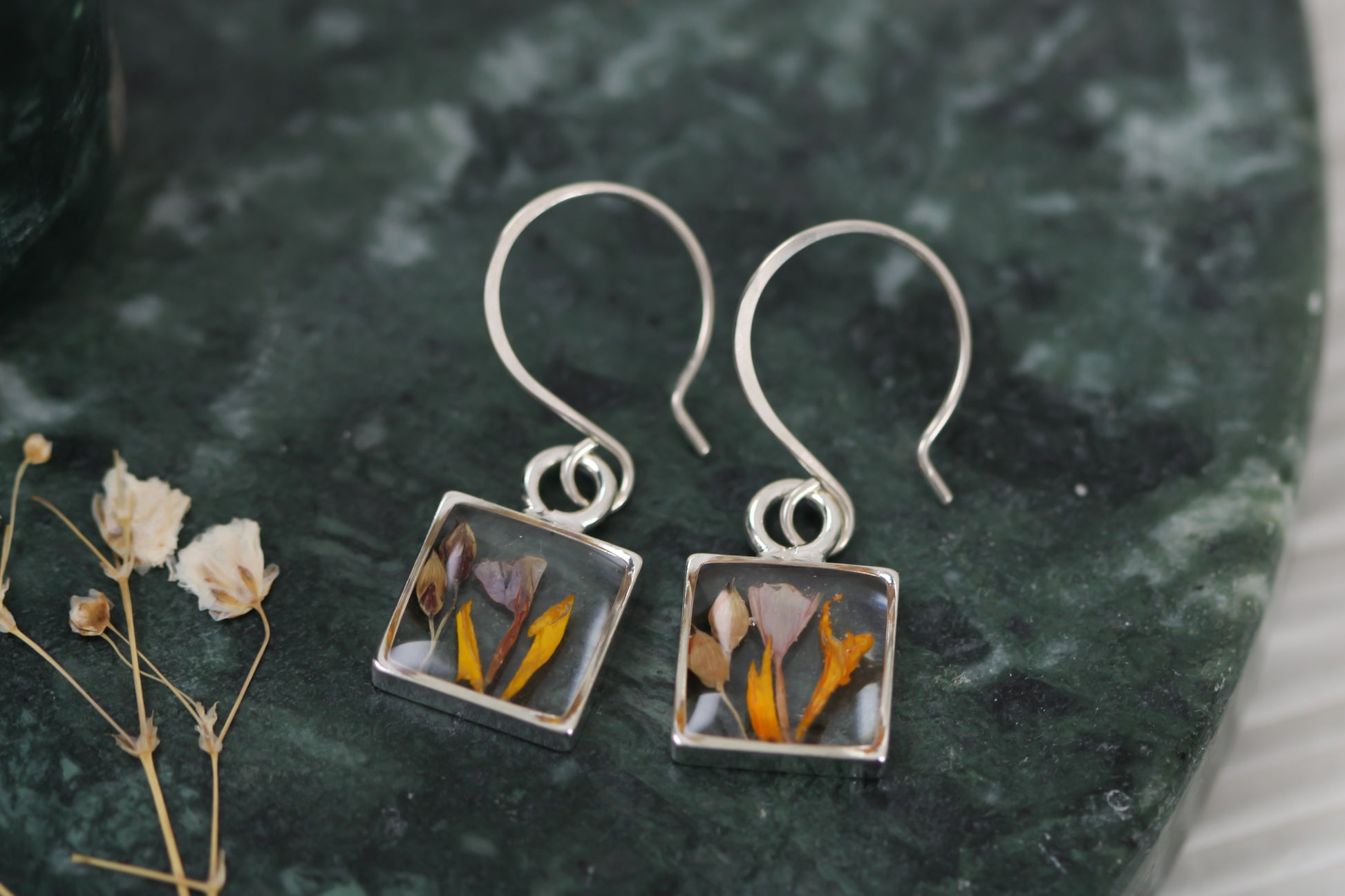 handmade resin and flower earrings, silver square shaped dangle earrings with marigold, statice and sorghum