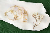 Gold Mini Rectangle Necklace with White Flowers