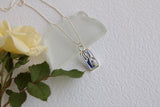 Silver Mini Rectangle Necklace with Blue Flowers