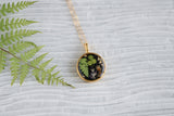 Gold Circle Necklace Black with Plants